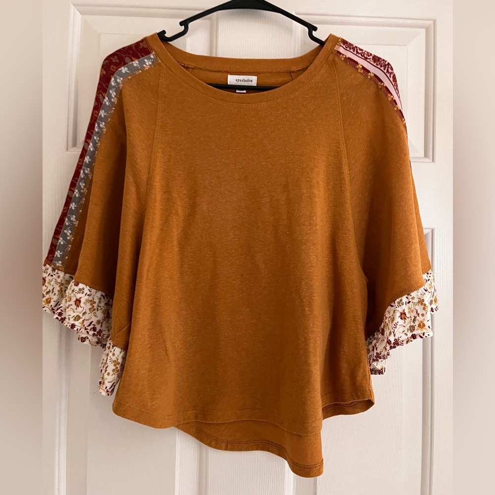 Eyeshadow brand top. Size Small. Pumpkin color fabric.